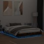 Estructura de cama con luces LED roble ahumado 120x200 cm