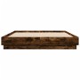 Estructura de cama con luces LED roble ahumado 120x200 cm