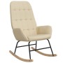 Silla mecedora de tela color crema