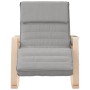Silla mecedora de tela gris claro