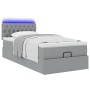 Cama otomana con colchón gris claro 100x200 cm tela