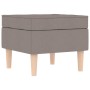Sillón con taburete reposapiés de tela gris taupe